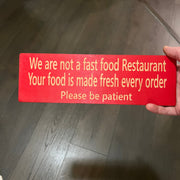 CUSTOM We are not a fast food restaurant please be patient Sign 11 X 3.5